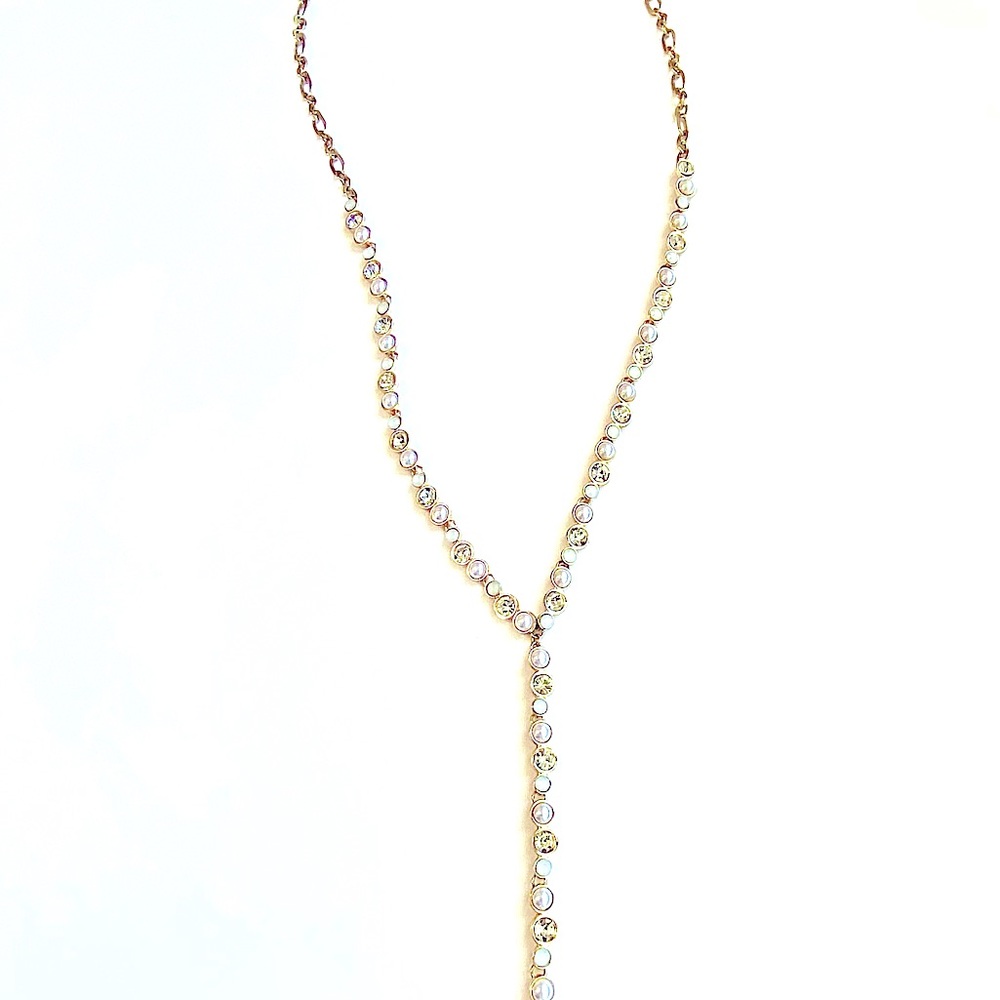 Francesca’s Long Gold Y shaped necklace. Rhinestones and pearls.
